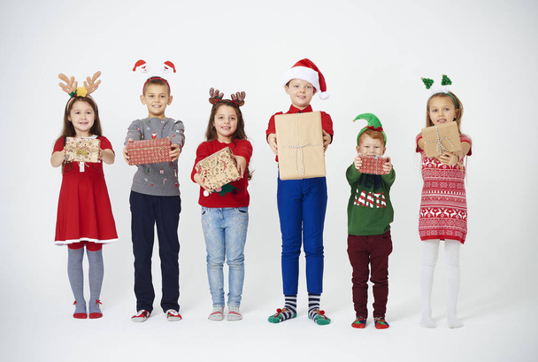 Shot of children showing their christmas present - Φωτογραφία, εικόνα