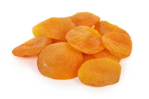 delicious and healthy dried apricots isolated on white background, healthy sweet snack - Foto, afbeelding
