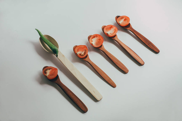 Kitchen utencils set for takeaway business: wooden recycling eco spoon, fork isolated on white side view. Eco style, wood, wooden cutlery - Photo, Image