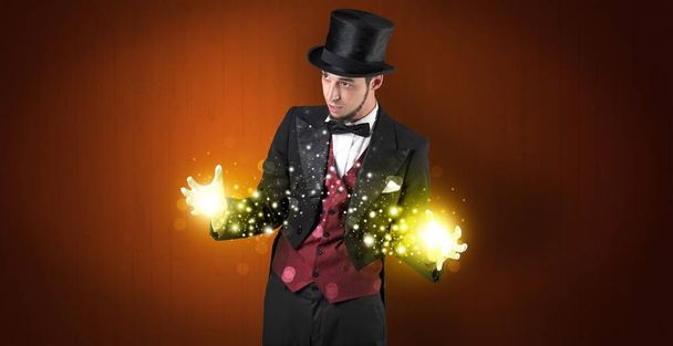 Illusionist holding superpower on his hand - Foto, immagini