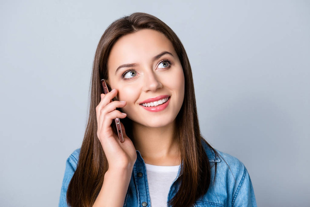 Close up portrait of young, brunette girl speaking on smart phon - Φωτογραφία, εικόνα