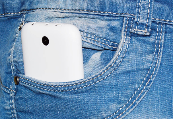 Blue jeans white smartphone in - Fotografie, Obrázek