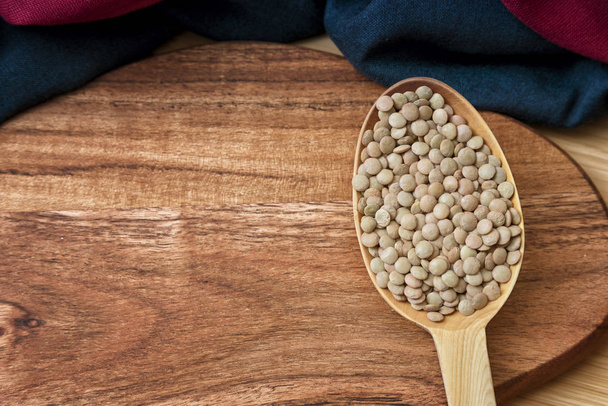 Wooden Spoon Full Of Green Lentils - Fotografie, Obrázek