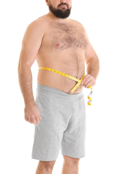 Overweight man in shorts  - Фото, изображение