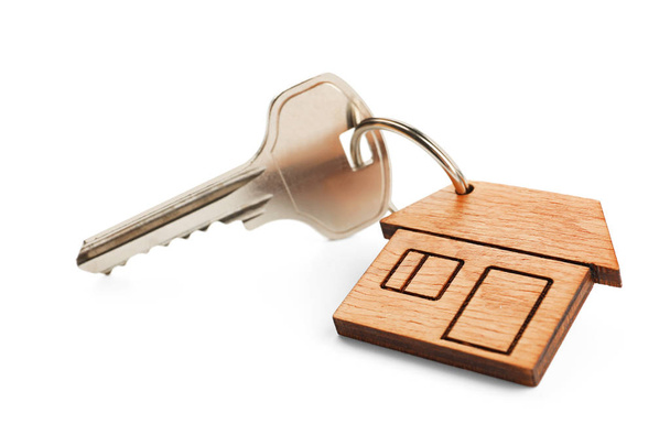 Key with trinket in shape of house  - Foto, afbeelding