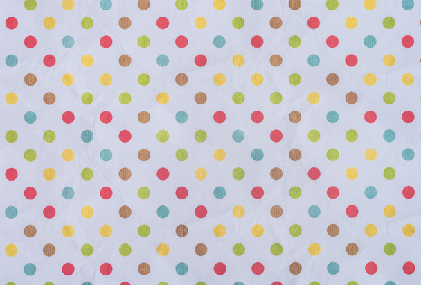 pink wrapper design with colorful dots  - Photo, Image