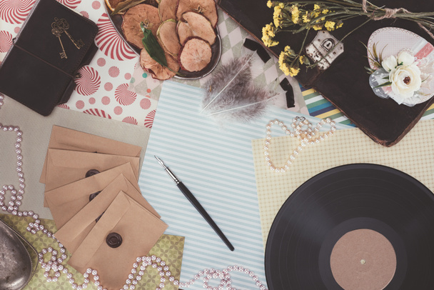 top view of retro objects over pack paper background - Photo, Image
