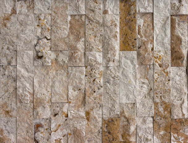 Stone wall texture, travertine tiles facing - Fotó, kép