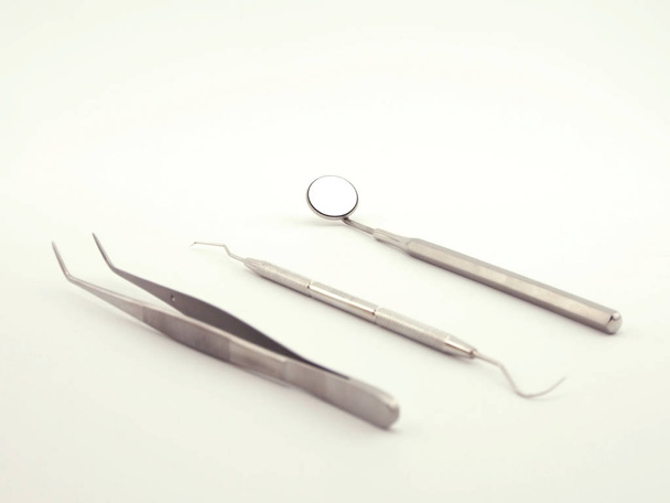 basic dental equipment on white background - Фото, изображение
