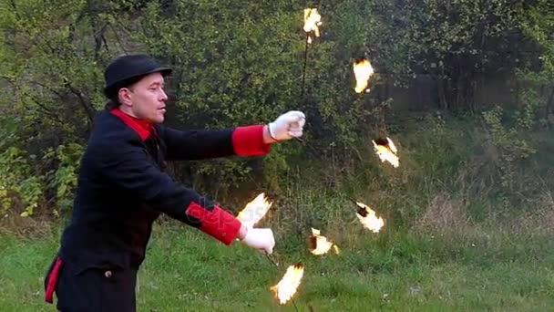 Courages Man Turns Two Metal Fans With Flamaround Himselff in Slo-Mo in Autumn - Footage, Video