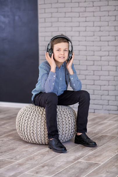 Relax and listening music concept. European boy fill the bit. Boy in casual wear. - Foto, Imagem