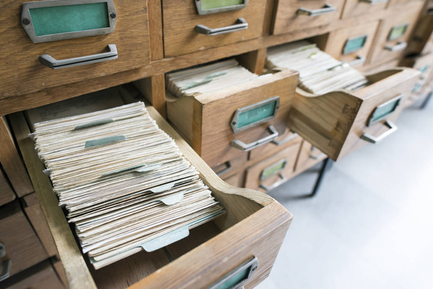 Old wooden drawers in archive - 写真・画像