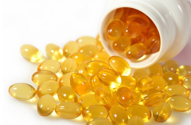 Omega-3 fish fat oil capsules in a bottle - Photo, Image