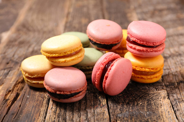 Macaroons on wooden table - Photo, image