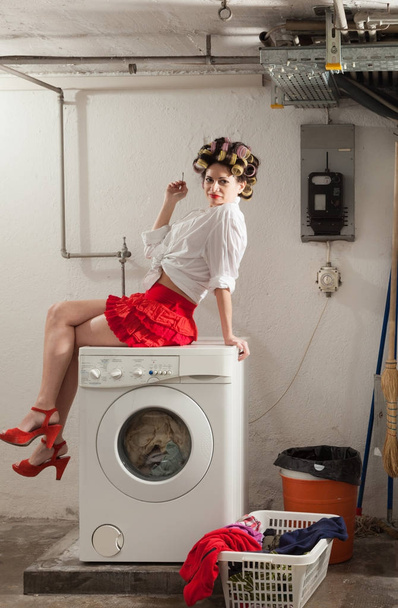 portrait of pretty woman in laundry - Photo, image