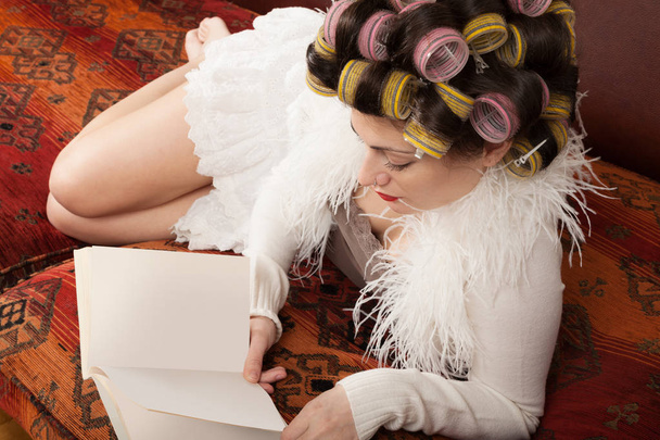 portrait of a model with a book - Zdjęcie, obraz