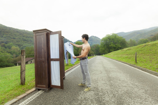 wooden wardrobe with a man - Foto, Imagem