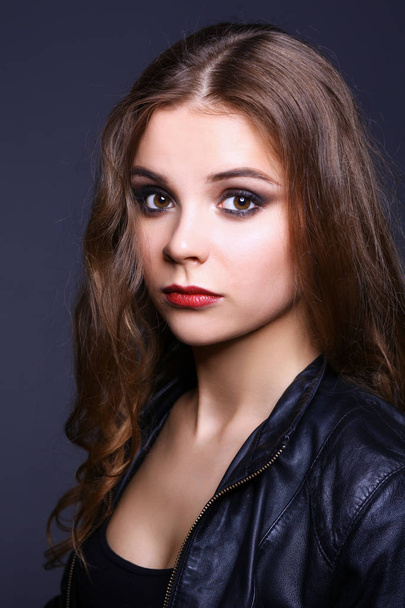 beautiful brunette girl on a black background - Foto, Imagem