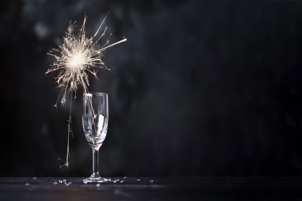 Champagne glass and sparkler - Photo, Image