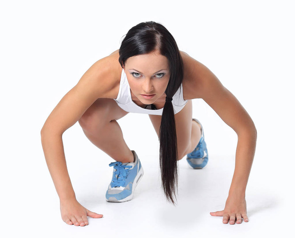 Attractive fitness woman doing low start cross fit exercises - 写真・画像