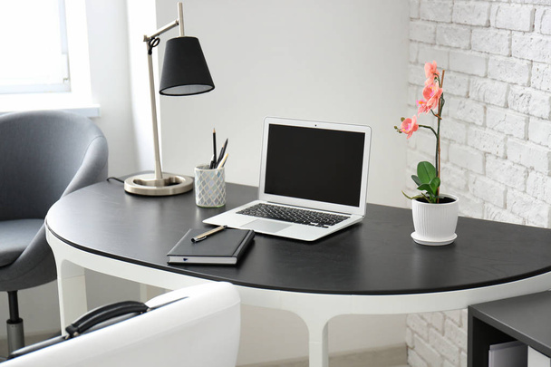 Comfortable workplace with laptop - Фото, зображення