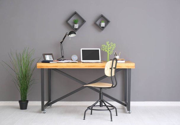 Comfortable workplace with laptop - Foto, imagen