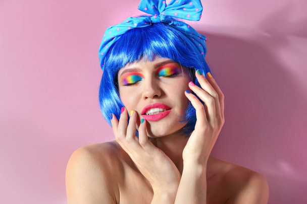 Young woman with rainbow makeup  - Фото, зображення