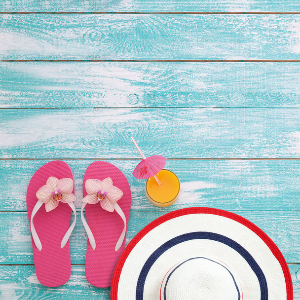 Summer fun time and accessories on blue wooden background. Mock up - Zdjęcie, obraz