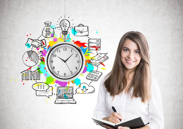 Cheerful young woman, organizer, time management - Photo, Image