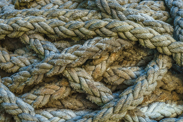 Twisted thick sea rope. Close-up view. Abstract background - Photo, image