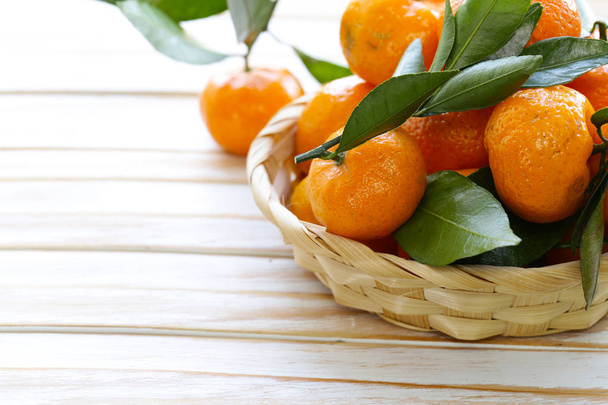 fresh organic mandarins with green leaves - Photo, Image