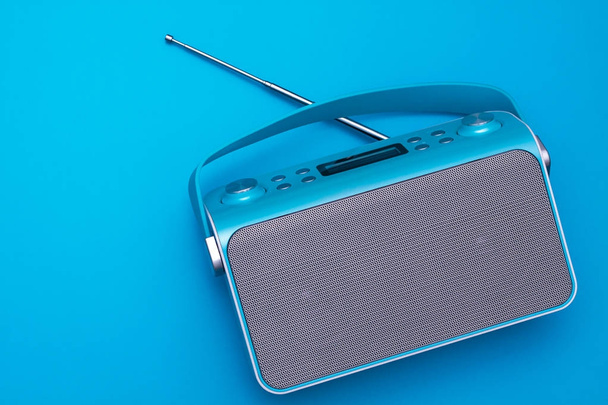 Top view on new digital blue radio, which it is stylized art retro style radio
. - Фото, изображение