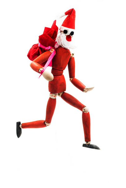 Kreative Weihnachtsmann-Holzpuppe mit Geschenktüte - Foto, Bild