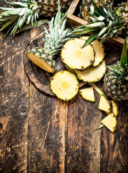Sliced fresh pineapple. - Фото, изображение