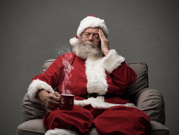 Santa Claus is having an headache - Photo, image