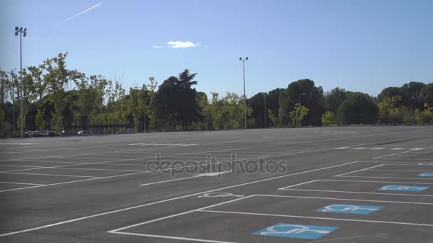 A leaft falling on the empty parking lot - Footage, Video
