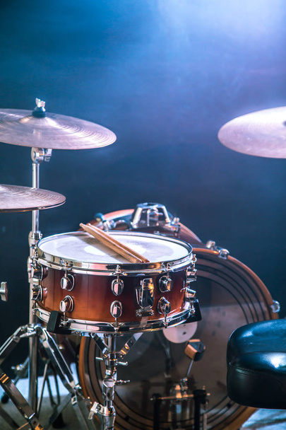 musical instruments drum kit, flash of light, a beautiful light in the background with copy space - Photo, Image