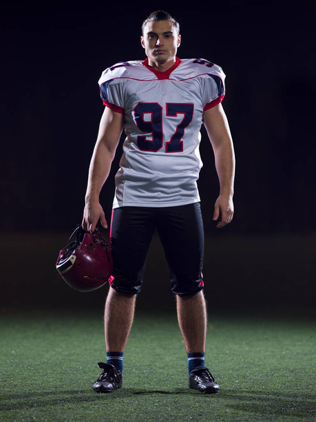 portrait of young confident American football player - Valokuva, kuva