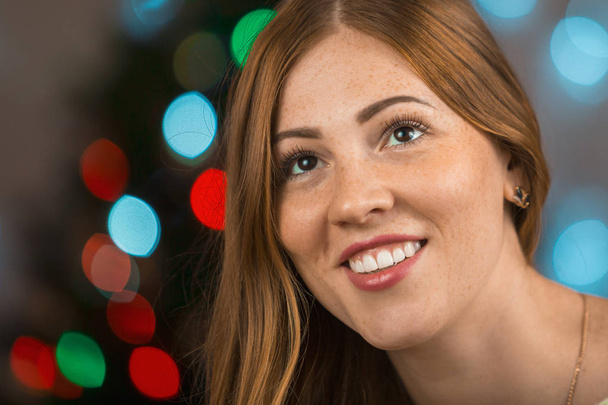 Portrait of a very beautiful smiling young woman. Female face closeup - Fotografie, Obrázek