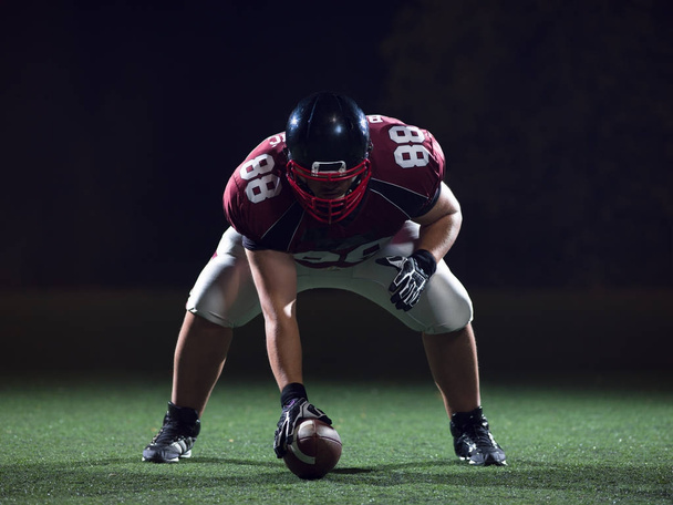 American football player starting football game - Фото, изображение