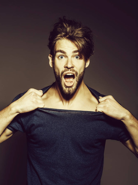 surprised man in fashionable shirt - Foto, Bild