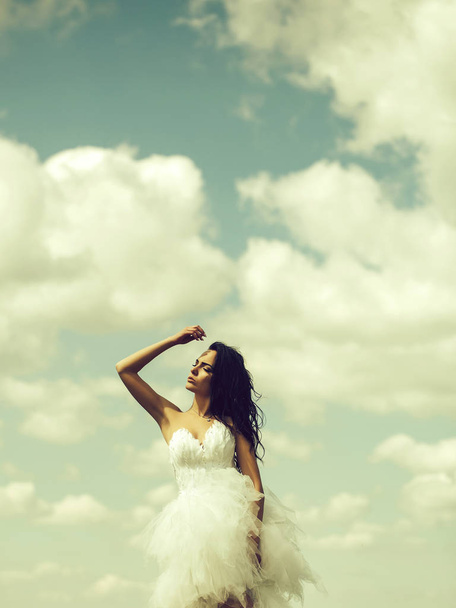 pretty wedding girl on blue sky - Фото, изображение
