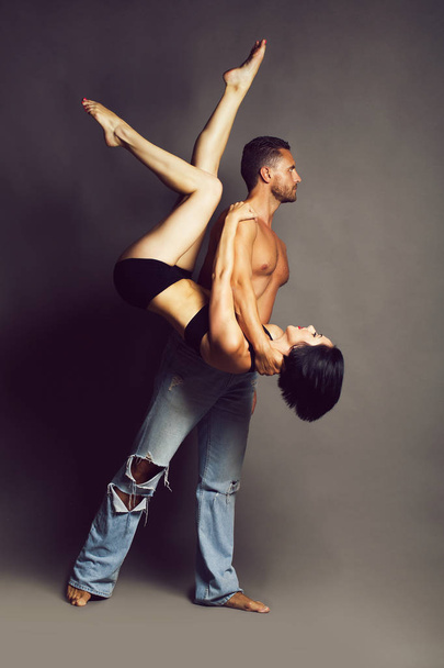 sexy young couple dancing in studio - Fotografie, Obrázek