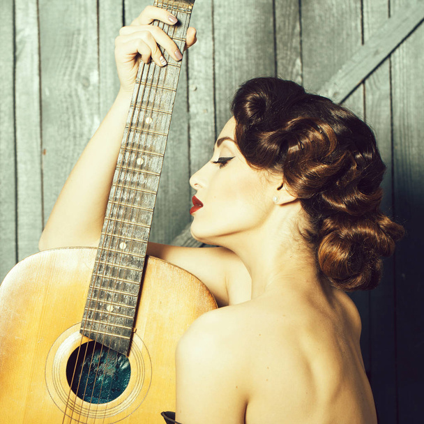 Retro woman with guitar - Фото, зображення