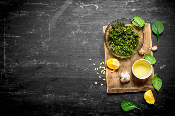 Pesto sauce with olive oil, garlic and other ingredients. - Photo, image