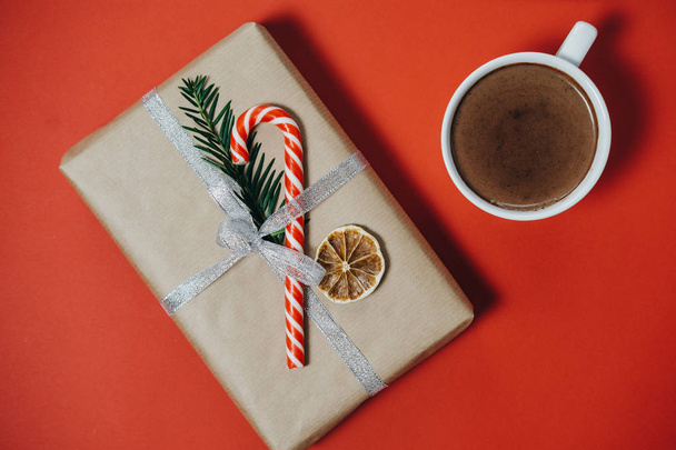 Christmas concept. Hot chocolate with fir tree, gift, candy cane - Foto, Imagen