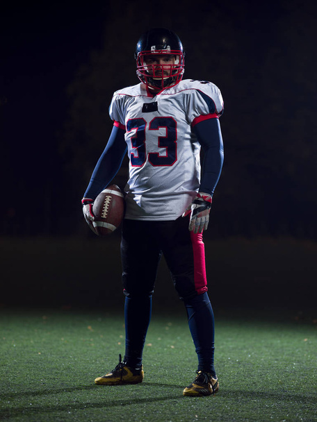 portrait of confident American football player - Photo, image