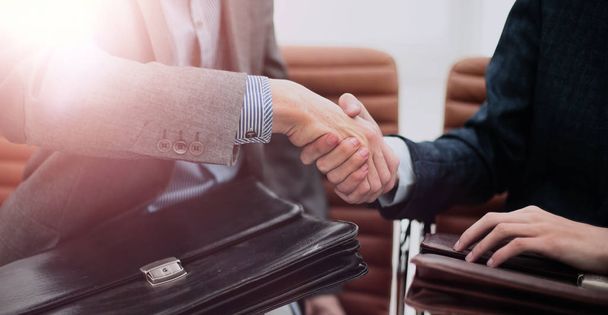 businessman shaking hands to seal a deal with his partner - Fotoğraf, Görsel