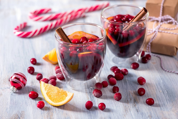 Mulled wine with cranberberries, winter drink - Photo, image