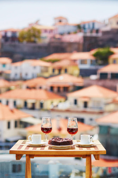 Madeira wine, coffee and hohey cake, View to Funchal, Portugal - Φωτογραφία, εικόνα